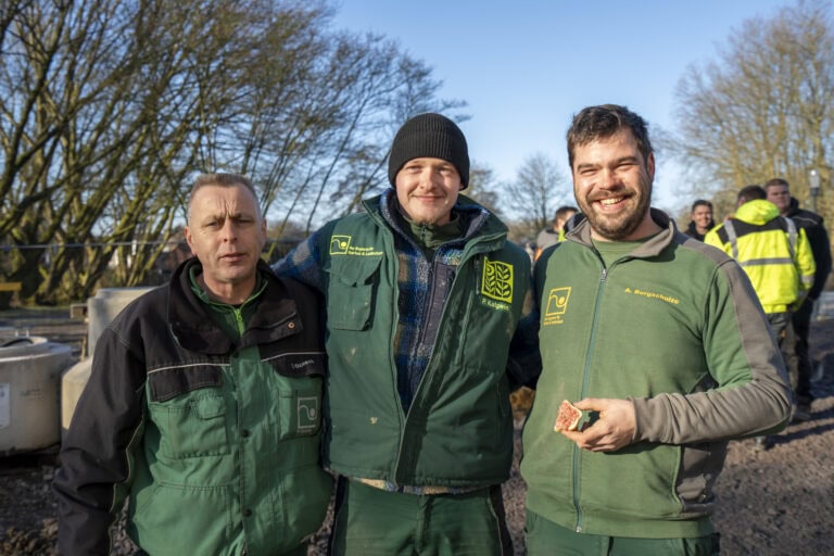Drei Kollegen von Baasner Garten- und Landschaftsbau im Teamfoto